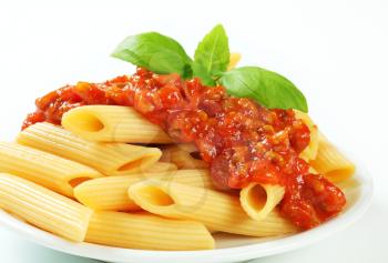Penne pasta with meat-based tomato sauce
