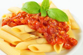 Penne pasta with meat-based tomato sauce