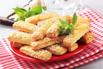 Cheese sticks with sesame seeds 