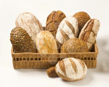 Assorted loaves of bread
 in a basket