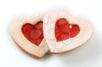 Heart shaped shortbread cookies with jam filling