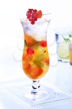 Cocktail drink with fresh fruit - closeup