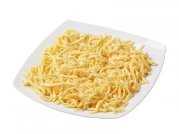 Plate of grated yellow cheese 