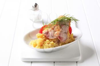 Marinated pan fried chicken breast with couscous