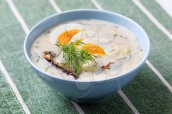 Cream soup with dill, mushrooms and egg