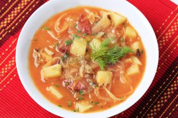 Cabbage soup with potatoes and sausage - detail