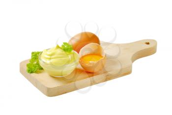 Bowl of homemade mayonnaise and fresh eggs