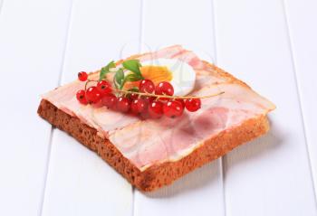 Slice of sandwich bread with bacon
