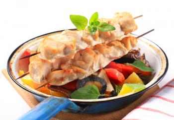 Chicken skewers and pan fried vegetables