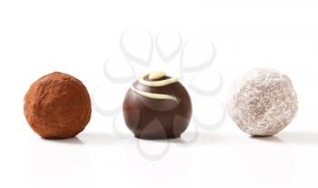 Assorted chocolate truffles and pralines with  ganache filling