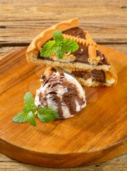 Slices of chocolate crostata with vanilla chocolate ice cream