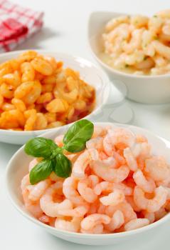 Bowls of plain and seasoned shrimps