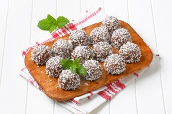 Chocolate snowball truffles rolled in coconut