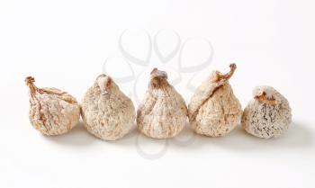 Studio shot of sugar-coated dried figs