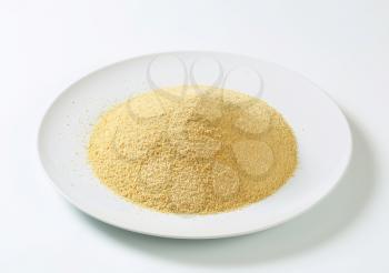 Dry bread crumbs on plate