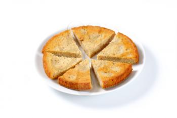 Spiced almond cake cut into slices