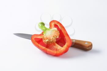 Half a red bell pepper and kitchen knife
