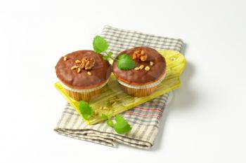Nut muffins with chocolate glaze