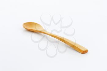 Small brown wooden dinner  spoon