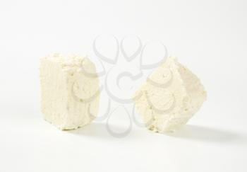 pieces of fresh curd cheese