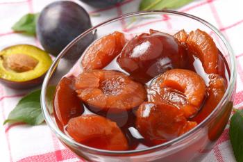 Damson compote in a glass bowl