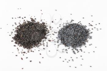 piles of ground and whole poppy seeds on white background