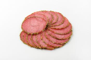 thin sliced salami with green pepper crust