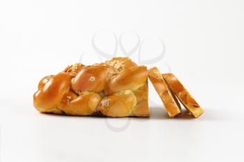 Christmas sweet braided bread on white background
