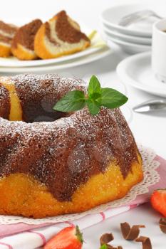 marble bundt cake and cup of coffee