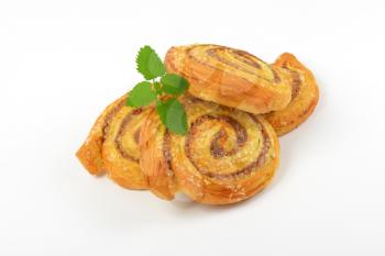 sweet cinnamon rolls on white background