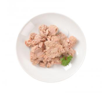 chunks of canned tuna on white plate