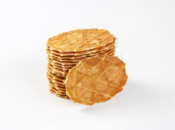 stack of butter waffle cookies on white background