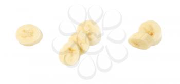 slices of banana on white background
