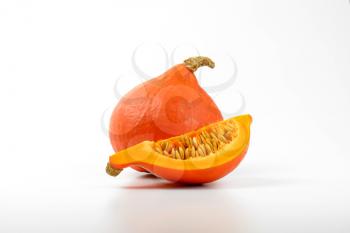 one and quarter of pumpkins on white background