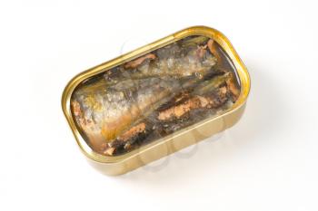 tin of sardines in oil on white background