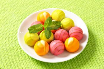 White chocolate pralines with fruit ganache filling