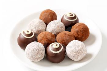 Assorted chocolate truffles and pralines with ganache filling