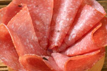 detail of thin slices of spicy salami