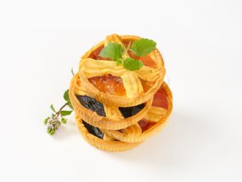 stack of apricot and plum jam tarts