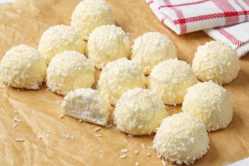 White Chocolate and Coconut Truffles on parchment paper