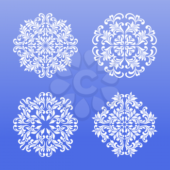 Set of lace snowflakes made of swirls and floral elements