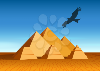 Egyptian  landscape with ancient pyramids and flying eagle.