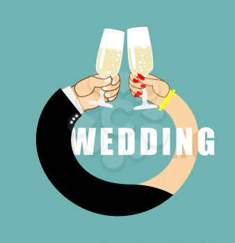 Wedding. Symbol of  ring from hands of  newlyweds. Bride and groom drink champagne. Glasses with white sparkling wine
