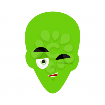 Green alien winks Emoji. UFO face happy emotion
