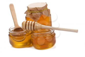three glass pot with honey