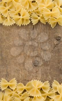pasta and spaghetti on wood background texture