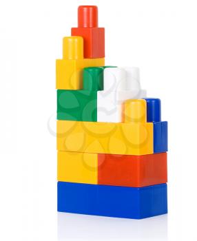 standing assemble of colorful plastic bricks