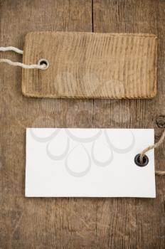 price tag over wooden board background