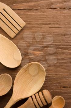 wood utensils on wooden background texture