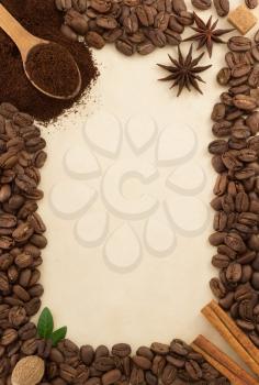 coffee beans and parchment as background